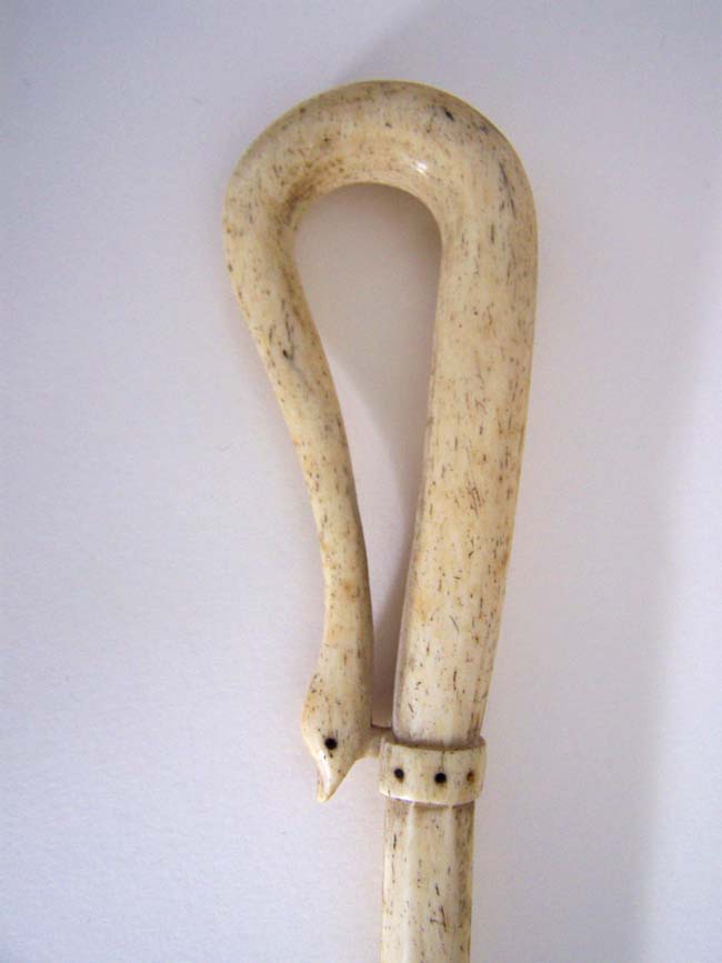 A rare Antique Whalebone One Piece Walking Stick with Curved Serpent Head Handle